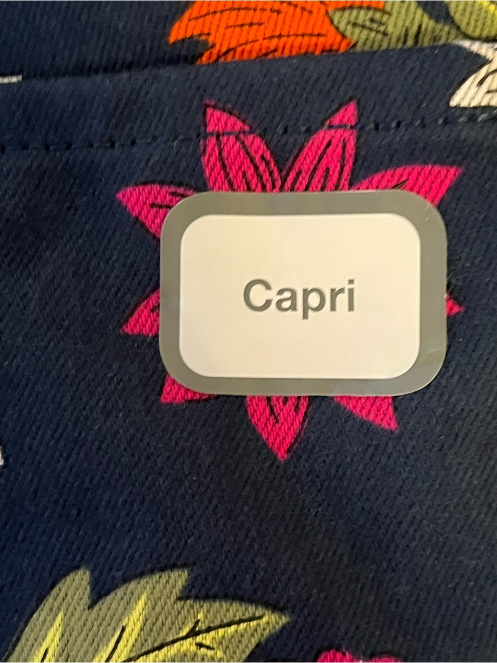 Navy capri leggings with floral print. - Picture 3 of 9